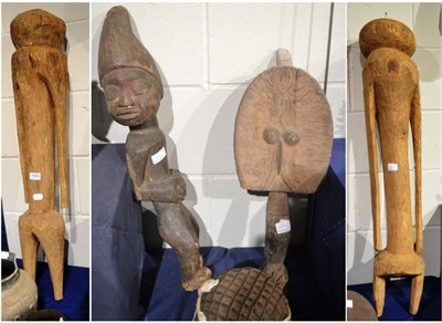 Lot 1004 - Two Moba ancestor figures, each with globular head, long arms and short legs; a Kota doll; and...