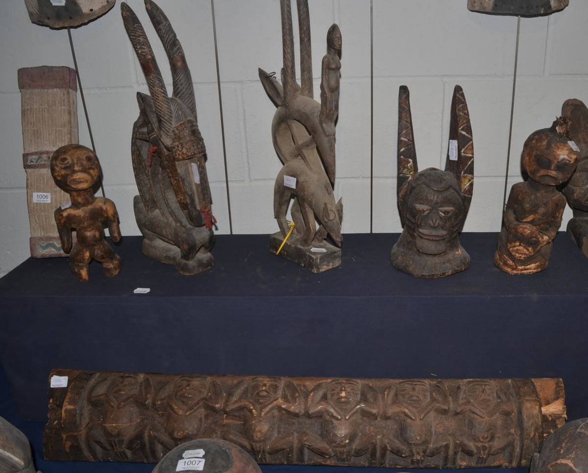 Lot 1006 - Two Bamana Tji-Wara antelope figures; Two Luba type small figures, one holding a mask; An Igbo...