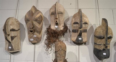 Lot 1011 - Five Songye male Kifwebe masks, one with raffia trim, DRC