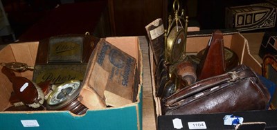 Lot 1104 - Two boxes containing metronome, surveyor's tape, barometer, trench art, small Gladstone bag, letter