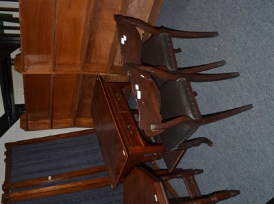 Lot 1139 - A Gothic style oak double sided bookcase, hexagonal occasional table, a mahogany side table, a pair