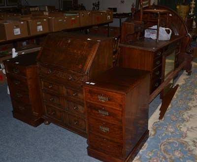 Lot 1147 - A late Victorian mahogany double bedstead, pair of later bedside chests of drawers, a 1920s oak...