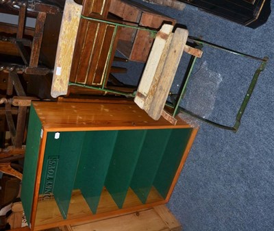 Lot 1177 - A pine glazed display cabinet lined in green baize together with a green painted folding garden...