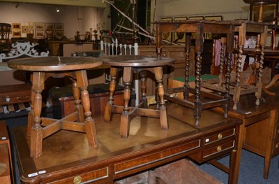 Lot 1182 - A pair of oak occasional tables with circular tops and a pair of oak occasional tables raised...