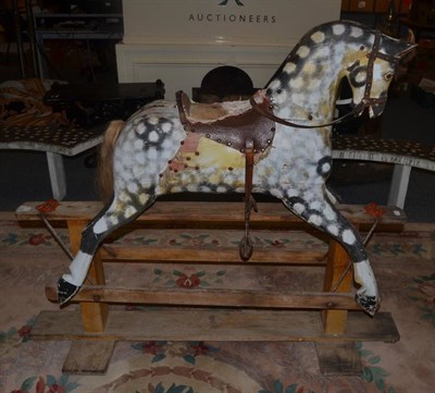 Lot 1189 - F H Ayres style dapple grey rocking horse on trestle base