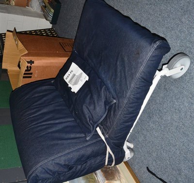 Lot 1206 - An Ikea PS Lovas chair bed in navy denim with mattress and cushion