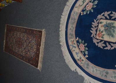 Lot 1207 - An Indian rug, the cream field of Herati design centred by a medallion framed by spandrels and...