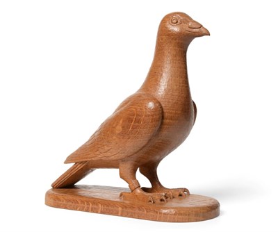 Lot 627 - Woodpeckerman: A Stan Dodds (1928-2012) Carved English Oak Racing Pigeon, with ring to leg, on...