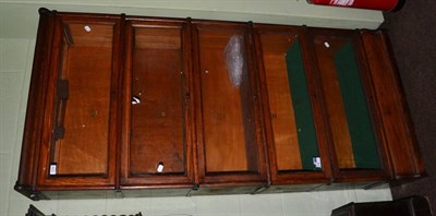 Lot 1256 - A five tier oak fall front display case