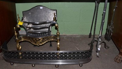 Lot 1259 - A reproduction fire grate, small fender and a companion set