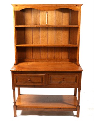 Lot 631 - Woodpeckerman: A Stan Dodds (1928-2012) English Oak Small Dresser and Rack, the rack with two fixed