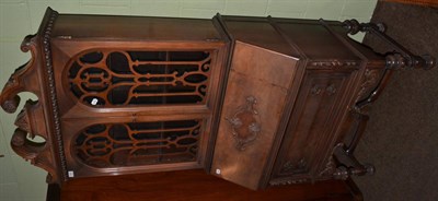 Lot 1267 - A bureau bookcase with carved and pierced fretwork decoration