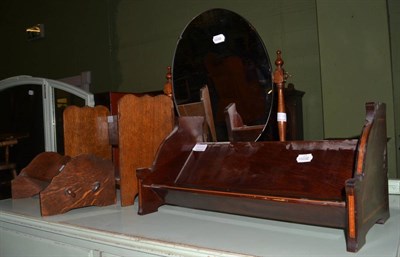 Lot 1275 - An inlaid mahogany twin handled tray, three book troughs and a toilet mirror