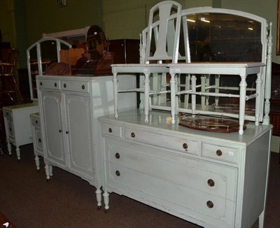 Lot 1276 - A green painted five piece bedroom suite comprising dressing table, tallboy, another dressing...