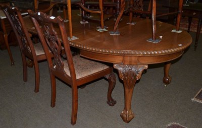 Lot 1278 - A 1920's dining table and four chairs