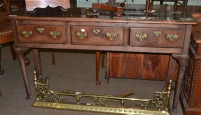 Lot 1287 - A George II fruitwood dresser base