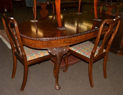 Lot 1292 - Walnut dining table and four dining chairs