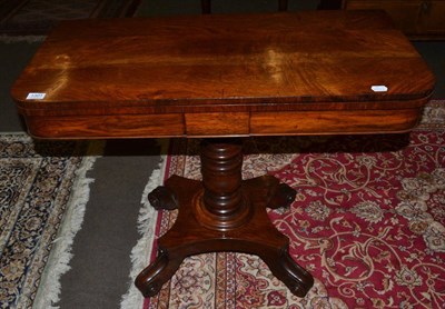 Lot 1301 - A 19th century mahogany fold over tea table