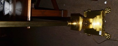 Lot 1305 - A reproduction brass Corinthian column standard lamp and silk shade