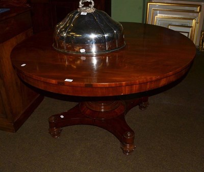 Lot 1307 - A Regency mahogany pedestal breakfast table raised on a quatreform platform base