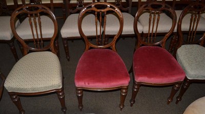 Lot 1315 - A set of four Regency mahogany dining chairs, the balloon backs with a three spindle splat