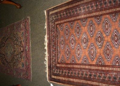 Lot 1326 - A Bukhara style rug and an Indo-Persian rug