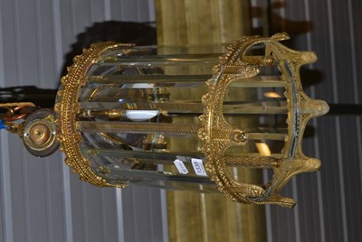 Lot 1338 - A dome topped glass and gilt metal lantern form ceiling light