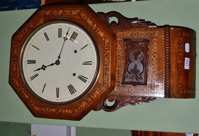 Lot 1342 - An inlaid striking wall clock