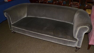 Lot 1345 - A Chesterfield type sofa upholstered in grey velvet