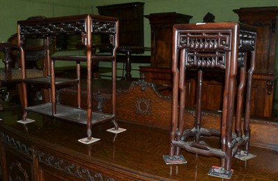 Lot 1360 - Two Chinese hardwood nesting tables and a Chinese tiered stand