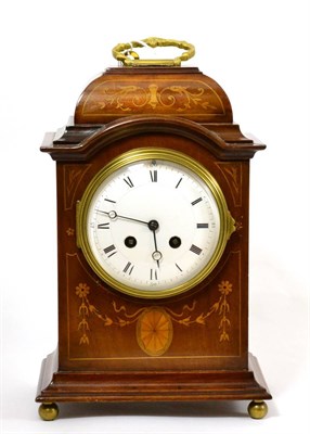 Lot 11 - Mahogany inlaid mantle clock with brass carrying handle, white enamel dial and keys