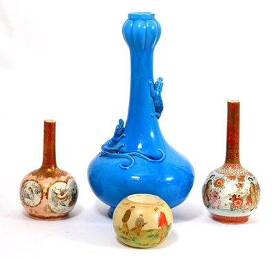 Lot 24 - A Carltonware vase decorated with golfers, two Japanese bottle vases and a late 19th century...