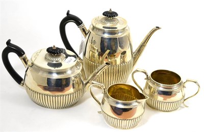 Lot 29 - An early 20th century silver four-piece tea set