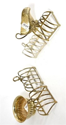 Lot 33 - Four silver toast racks, a part-gadrooned sugar bowl and a Continental small sauce boat