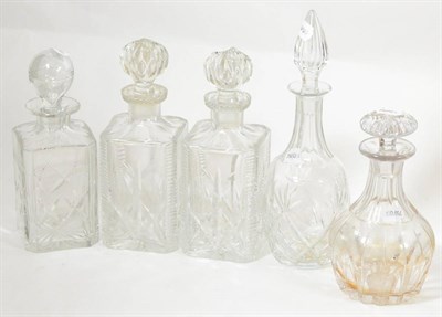 Lot 36 - Five cut glass decanters with stoppers