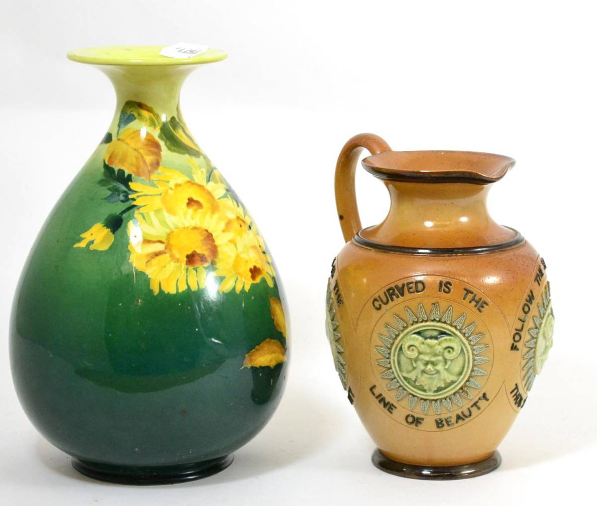 Lot 40 - Doulton stoneware jug and a painted pottery vase