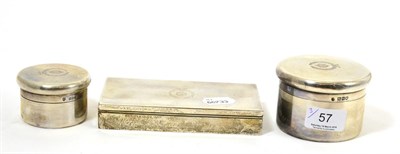 Lot 57 - Silver rectangular toiletry box and two circular boxes matching, London 1913