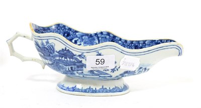 Lot 59 - An 18th century Chinese blue and white sauce boat