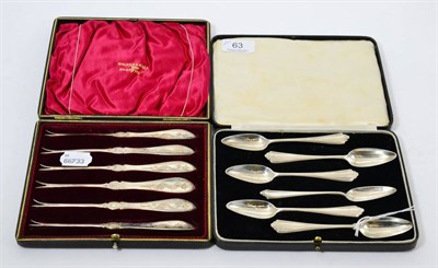 Lot 63 - A set of six engraved silver lobster picks, Sheffield 1902, and a set of six grapefruit spoons,...