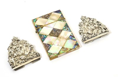 Lot 69 - A silver embossed buckle and a mother-of-pearl card case