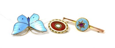 Lot 87 - A blue enamelled butterfly brooch and two other enamelled brooches (3)