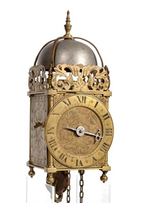 Lot 658 - A Small Brass Hook and Spike Lantern Striking Wall Clock, signed Geo Clarke, Londini Fecit,...