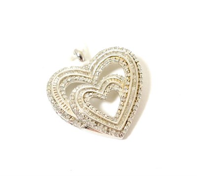 Lot 92 - A diamond set heart shaped pendant