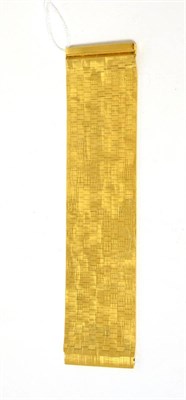 Lot 102 - A 9ct gold broad textured bracelet, length 17cm, width 4.2cm