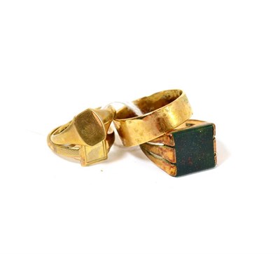 Lot 109 - A 9ct bloodstone ring, finger size R½ , a 9ct gold signet ring, finger size O, a 9ct gold...