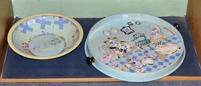 Lot 129 - A studio pottery circular tray decorated with rabbits and chairs and another studio pottery...