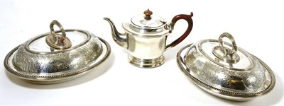 Lot 131 - A silver teapot and a pair of plated entrée dishes