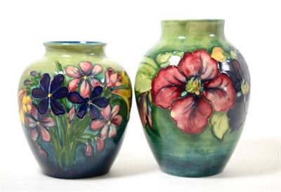 Lot 164 - A Moorcroft Clematis pattern vase, 18cm high and another Spring Flowers pattern, 15.5cm high (2)