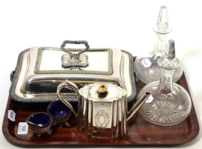 Lot 168 - A silver plated entree dish, a silver plated tea pot, a pair of glass decanters (a.f.) and two...