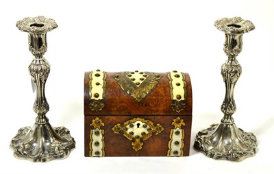 Lot 173 - A pair of Victorian silver plated candlesticks and a Victorian figured walnut dome top tea caddy